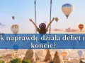 Dziewczyna na huśtawce wpatruje się w balony na gorące powietrze, zastanawiając się, jak naprawdę działa debet na koncie.