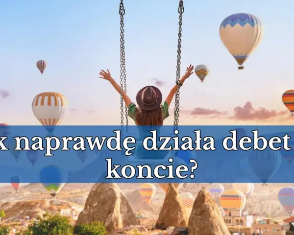 Dziewczyna na huśtawce wpatruje się w balony na gorące powietrze, zastanawiając się, jak naprawdę działa debet na koncie.